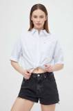 Prevelik Tommy Jeans Majice & Topi za dame image