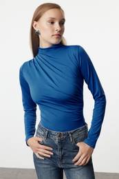 Flexible Knitted Bodysuit with Saks Ruffle Detail, High Collar and Snap Fasteners