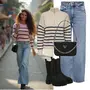 Chelsea Boots mit Wide Leg Jeans kombinieren image