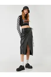 Midi Skirt with Deep Slits and Wrapover Fastening with a Leather Look.