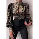 Elegante Bluse Mit Hohem Kragen Und Glockenförmigen Ärmeln  Diezma, Schwarz - Gold