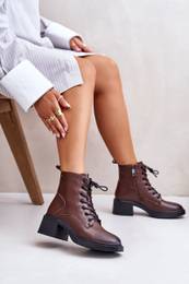 Insulated women's ankle boots on a low heel made of natural leather brown